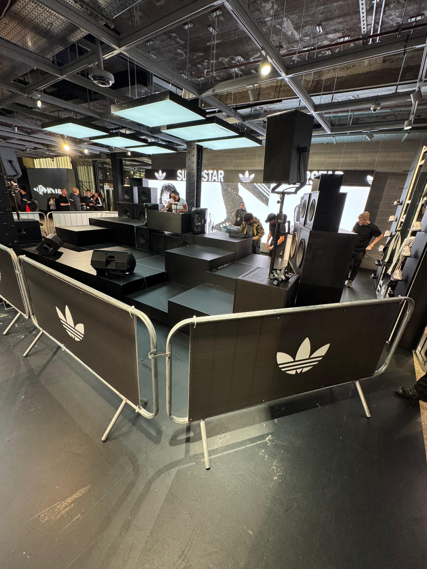 Custom black stage, sound system and DJ booth built for a brand event in London